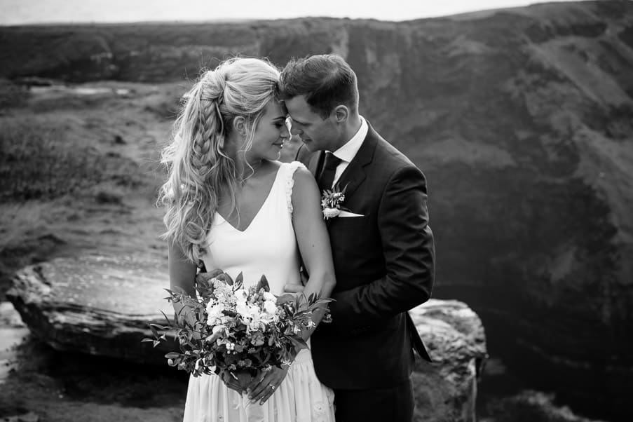 B&W Cliff Top Intimate Moment Aoibin and John
