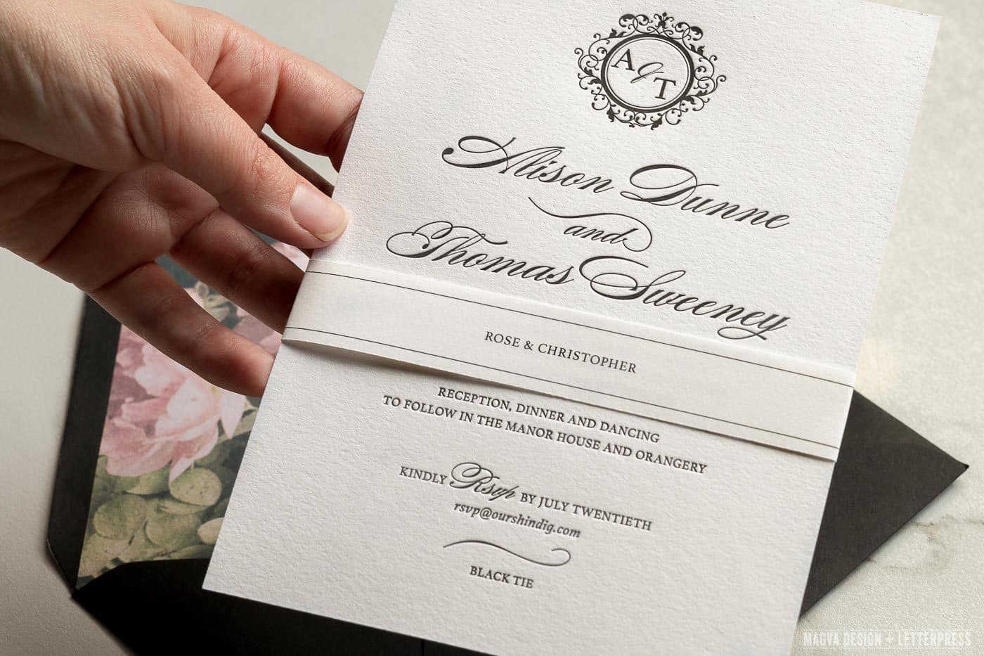 Wedding invite with guests names on a belly band