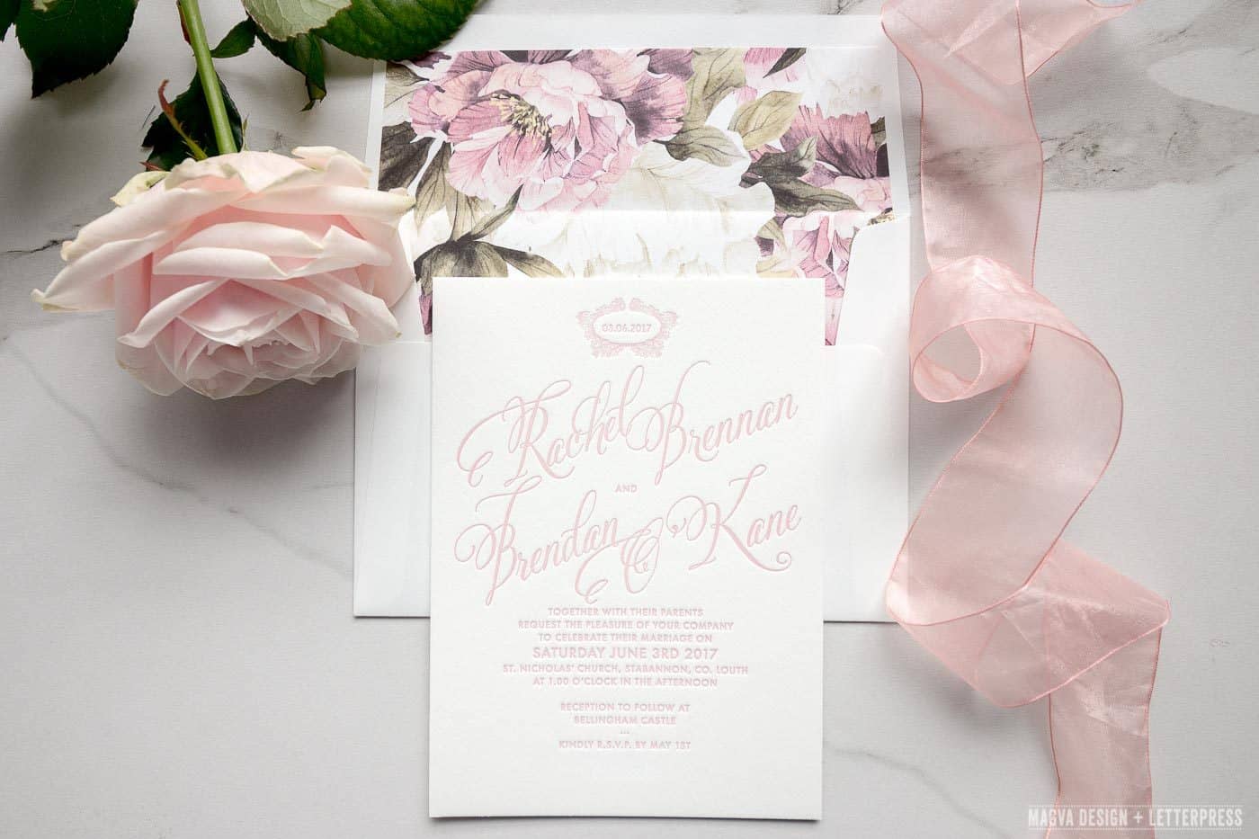 Wedding invitation printed in pink with matching envelope liners